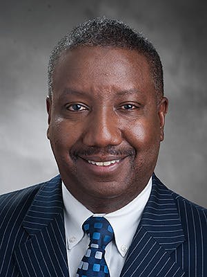 Dr. Darrien Lance Gaston, MD